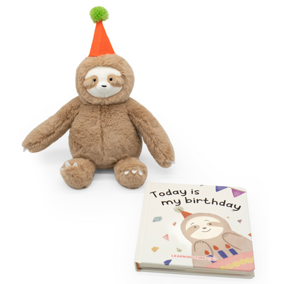 Plush sloth toy wearing a party hat with a children's book titled 'Today is my birthday' on a white background.
